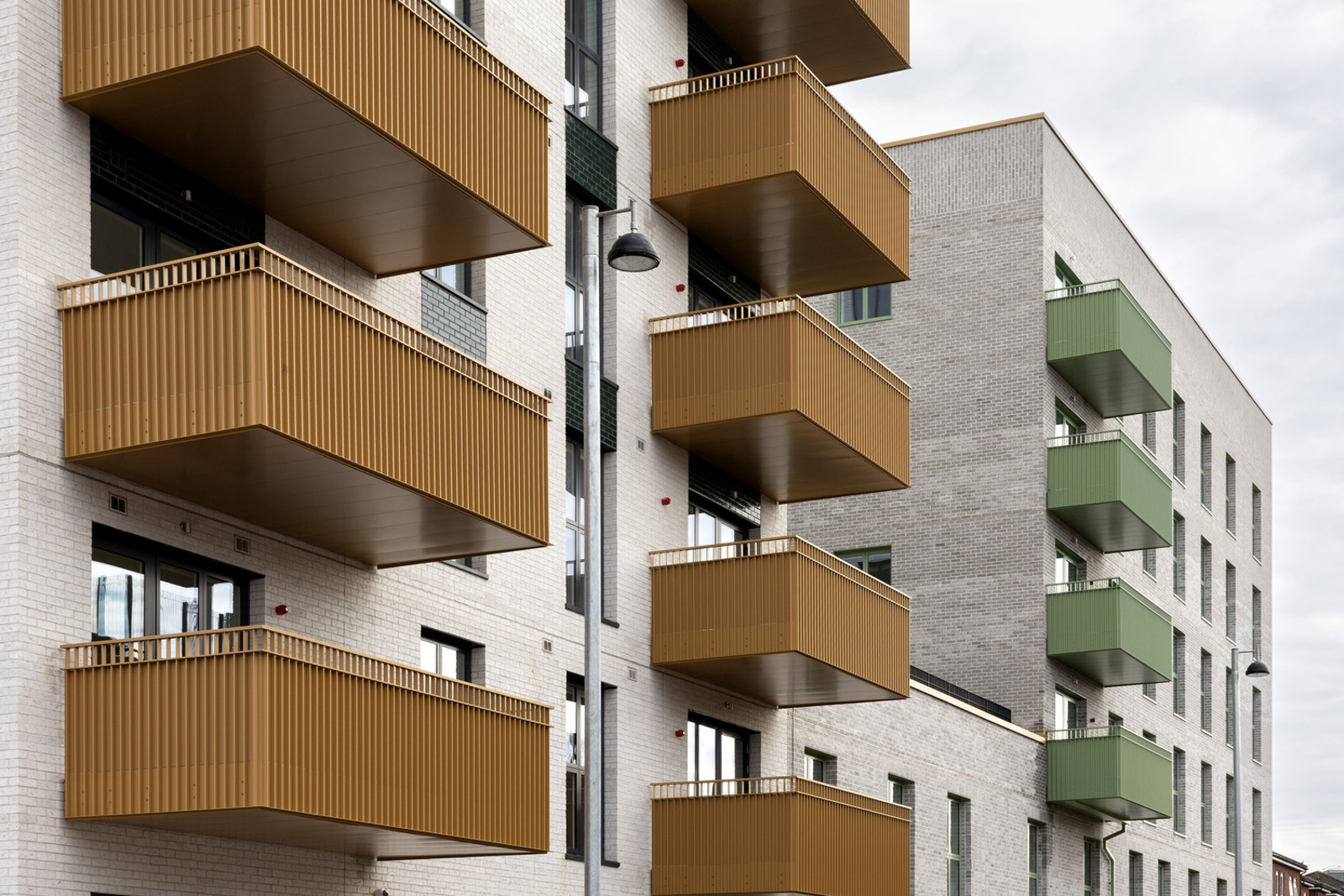 New homes with gold and green balconies